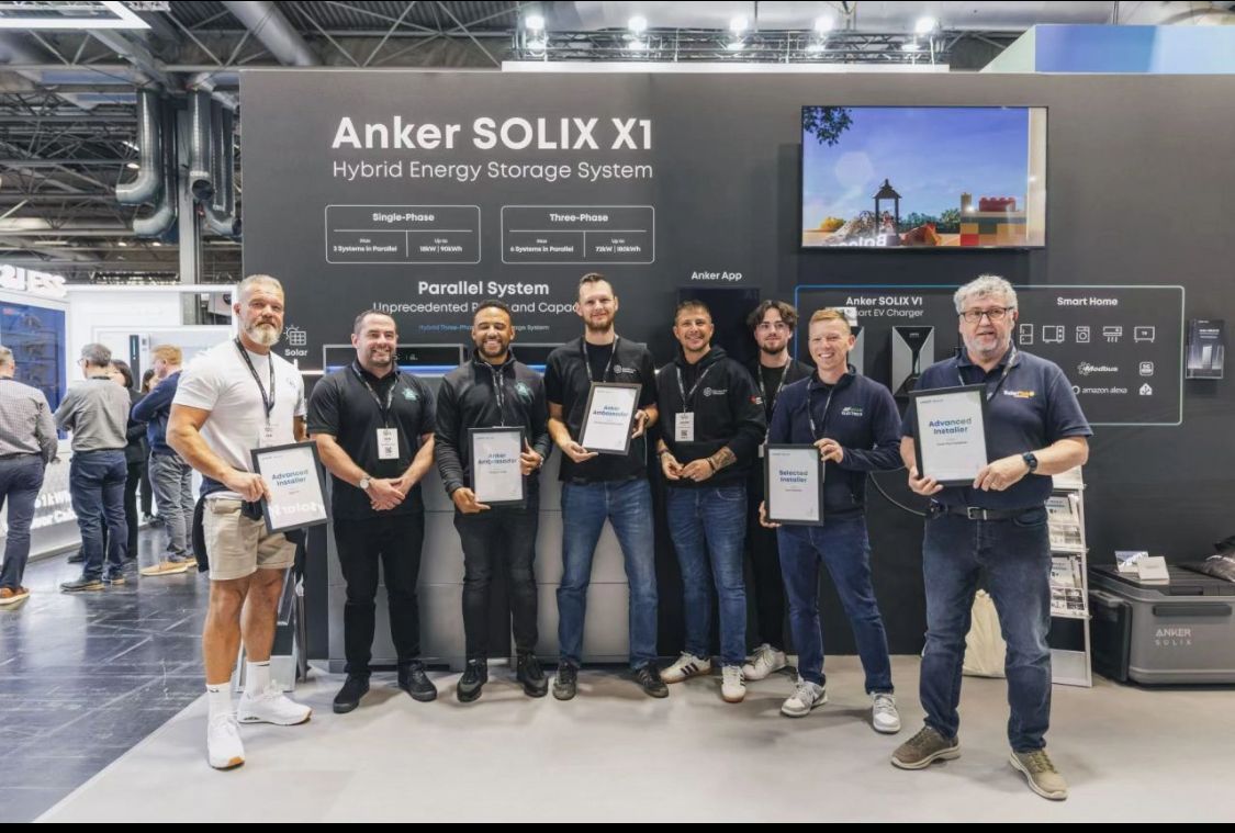 SolarFX team with Anker SOLIX X1 hybrid energy storage system display